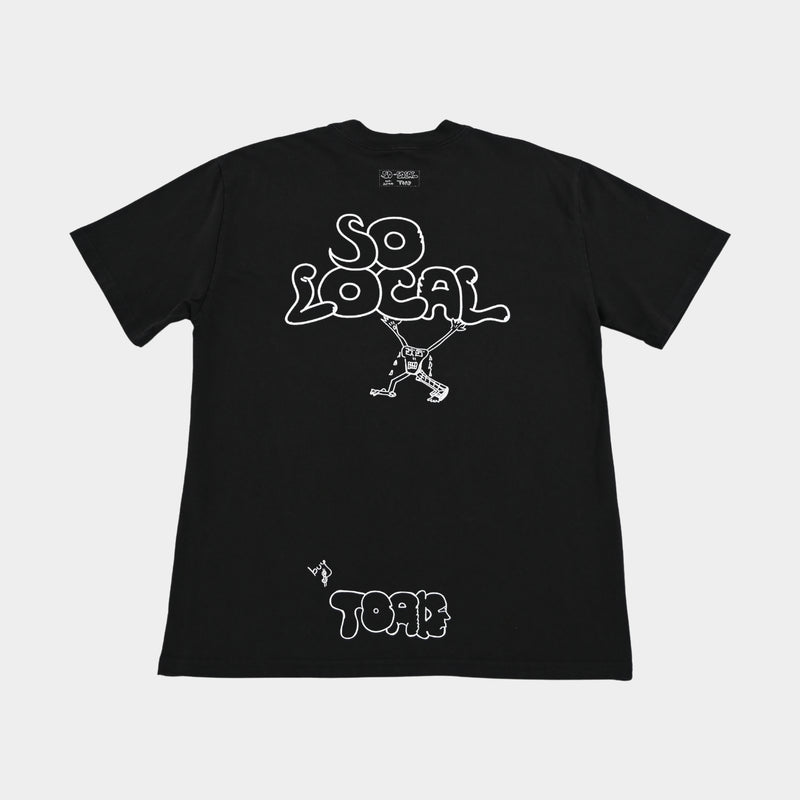 Back flatlay of SO LOCAL heavy faded t-shirt in black, surf and skate streetwear, Gold Coast Australia  