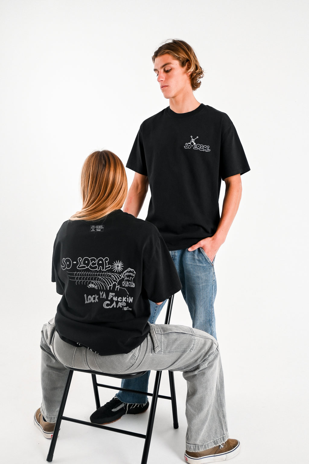 Male and female models wearing CURRUMBIN ALLEY RATS heavy faded t-shirt in butter, surf and skate streetwear, studio shot, Gold Coast Australia 