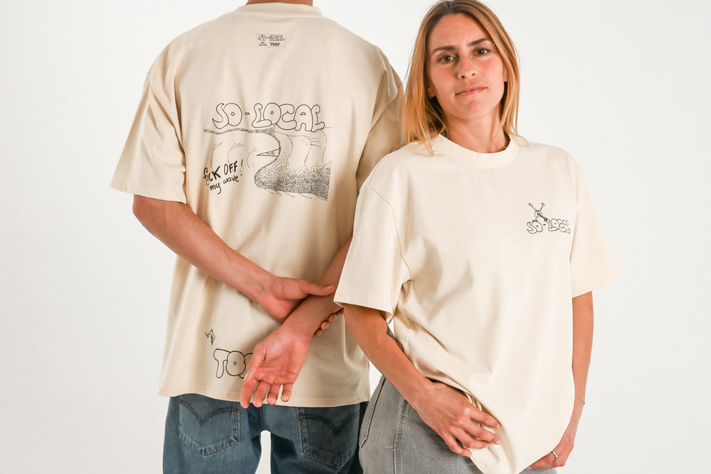 Male and female models wearing F*CK OFF MY WAVE  heavy faded t-shirt in butter, surf and skate streetwear, studio shot, Gold Coast Australia 
