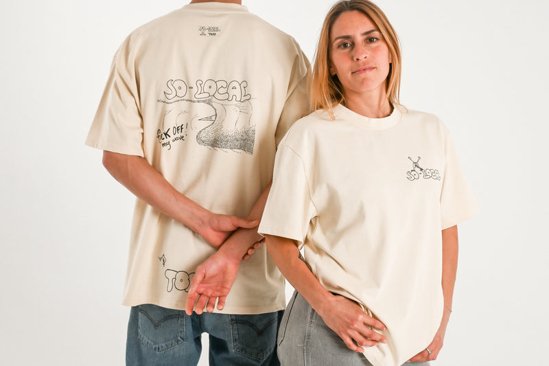Male and female models wearing F*CK OFF MY WAVE  heavy faded t-shirt in butter, surf and skate streetwear, studio shot, Gold Coast Australia 