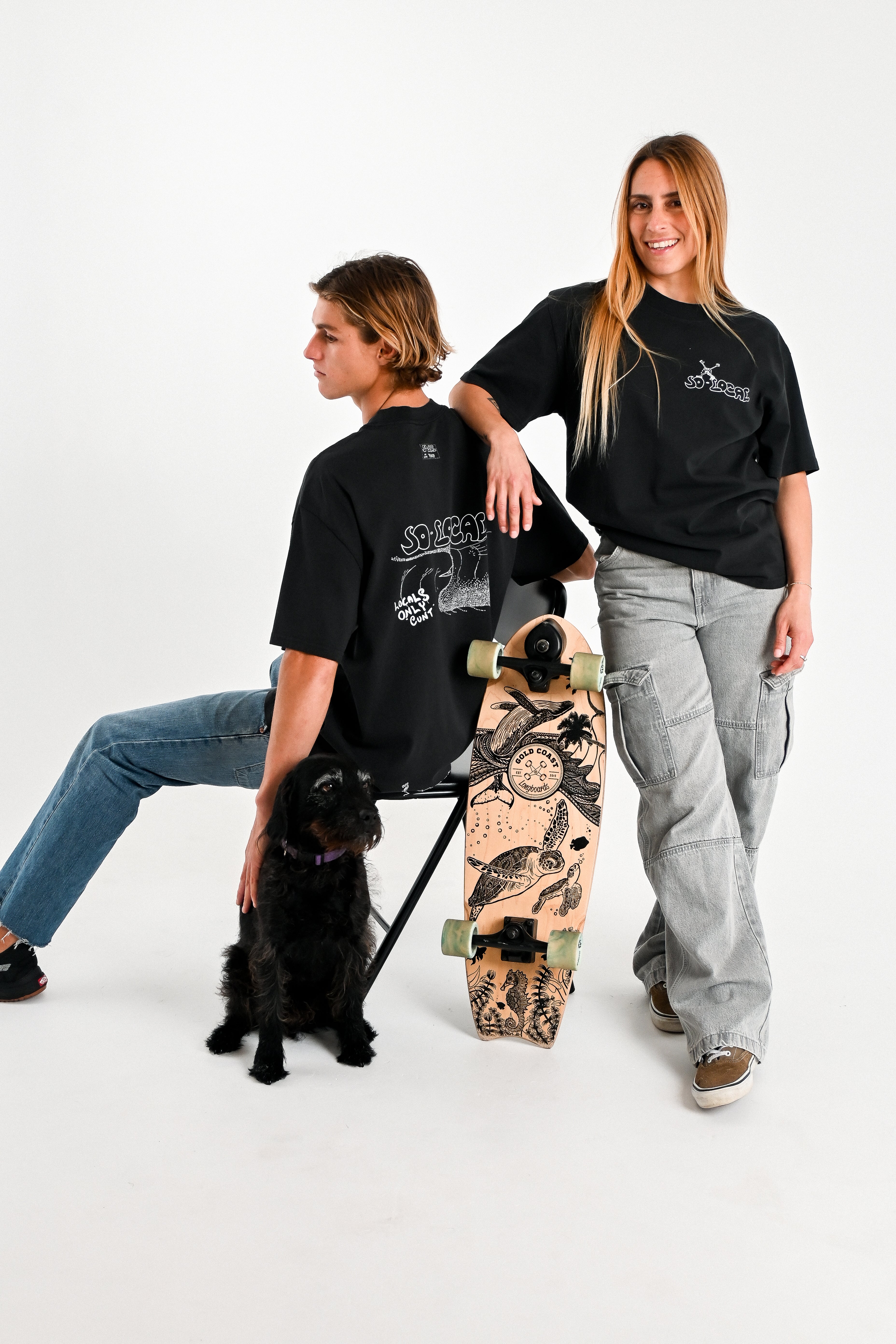 Male and female models wearing LOCALS ONLY C#NT heavy faded t-shirt in black, surf and skate streetwear, studio shot, Gold Coast Australia 