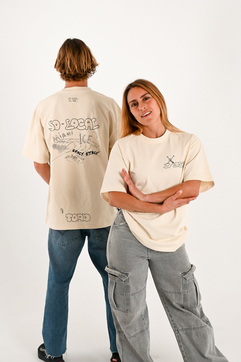 Male and female models wearing MIAMI ICE heavy faded t-shirt in butter, surf and skate streetwear, studio shot, Gold Coast Australia 