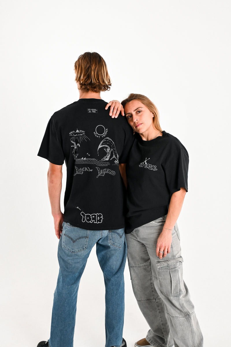Male and female model wearing NIGHT TRIPPER "Local Legend" heavy faded t-shirt in black, surf and skate streetwear, studio shot, Gold Coast Australia  