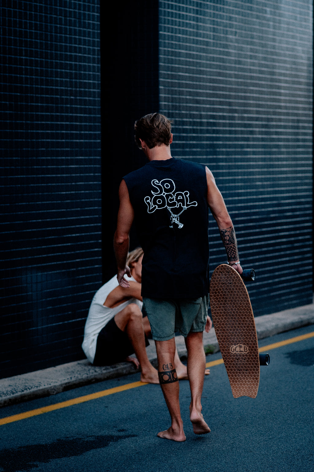 Males models wearing SO LOCAL / TANK TEE heavy faded t-shirt in black and white, surf and skate streetwear, lifestyle photo, Gold Coast Australia 