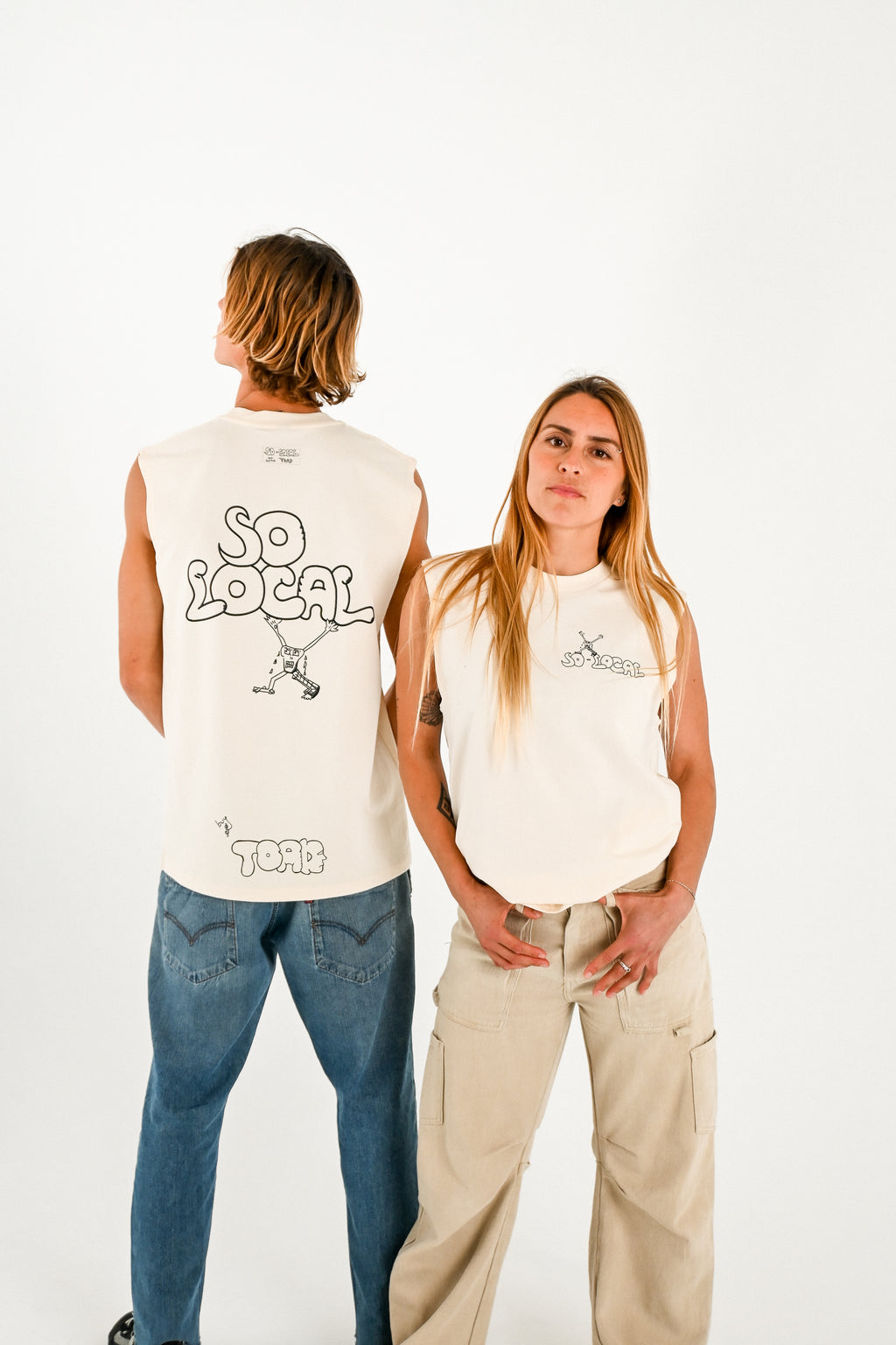 Male and female models wearing SO LOCAL / TANK TEE heavy faded t-shirt in butter, surf and skate streetwear, studio shot, Gold Coast Australia 