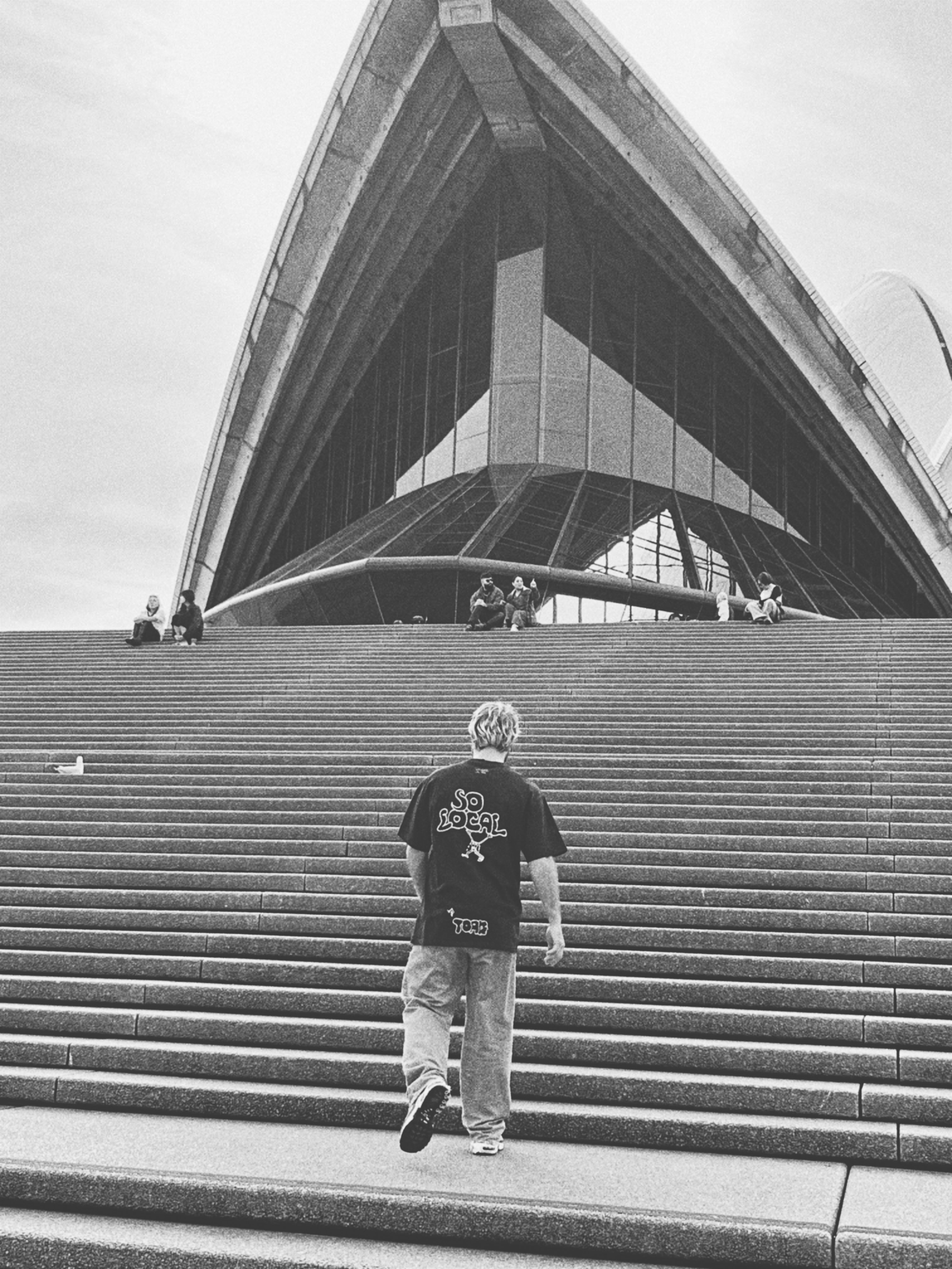 SO LOCAL heavy faded t-shirt featuring Angsty mascot, Gold Coast surf and skate streetwear
